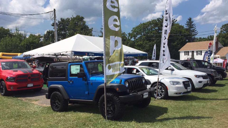 Wetmore’s display at the Bridgewater Fair with Jeep and Chrysler vehicles in Connecticut