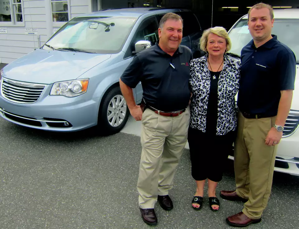 Scott Brittingham Sr., Jinny Brittingham, and Scott Brittingham Jr. at Wetmore’s dealership in New Milford CT